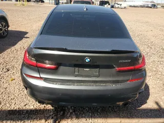 2021 BMW 3 Series 330i with VIN 3MW5R1J06M8B67021, listed as a Copart auction lot 49488195 with 67,806 mi miles and Salvage Title. Bid and sale history available at carsss.com. Image 6.