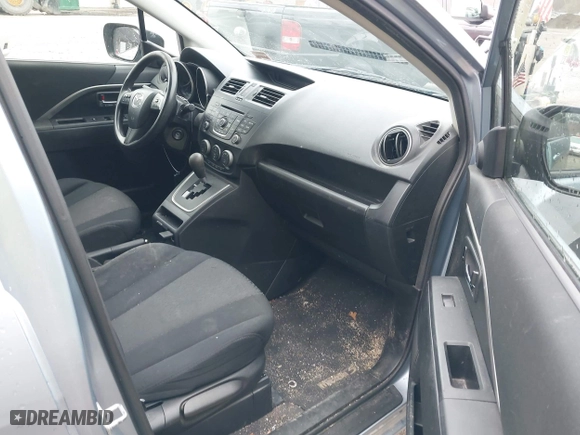 2012 Mazda Mazda5 Sport with VIN JM1CW2BL0C0141119, listed as a IAAI auction lot 42073200 with 142,805 mi miles. Bid and sale history available at carsss.com. Image 5.