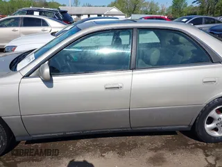1998 Lexus ES 300 Luxury Sport Sdn with VIN JT8BF28G1W5049917, listed as a IAAI auction lot 42093778 with 331,253 mi miles. Bid and sale history available at carsss.com. Image 14.