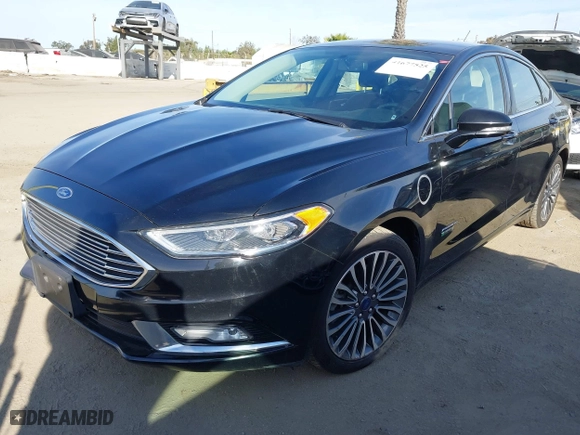 2017 Ford Fusion Energi SE with VIN 3FA6P0PU7HR373391, listed as a IAAI auction lot 41677525 with 99,499 mi miles. Bid and sale history available at carsss.com. Image 19.