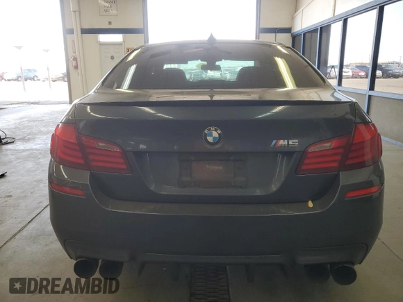 2013 BMW M5 z VIN WBSFV9C54DC773221, wystawiony jako Copart lot #54831865 z przebiegiem 127 949 mil mil oraz Czysty tytuł • Clean title. Historia ofert i sprzedaży dostępna na DreamBid. Obrazek 6.