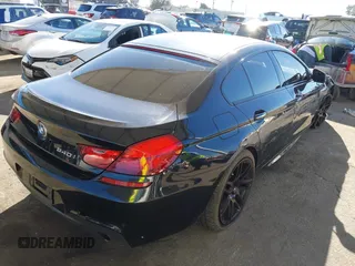 2015 BMW 6 Series 640i with VIN WBA6A0C52FGB53591, listed as a IAAI auction lot 41247695 with 81,828 mi miles and . Bid and sale history available at DreamBid. Image 4.