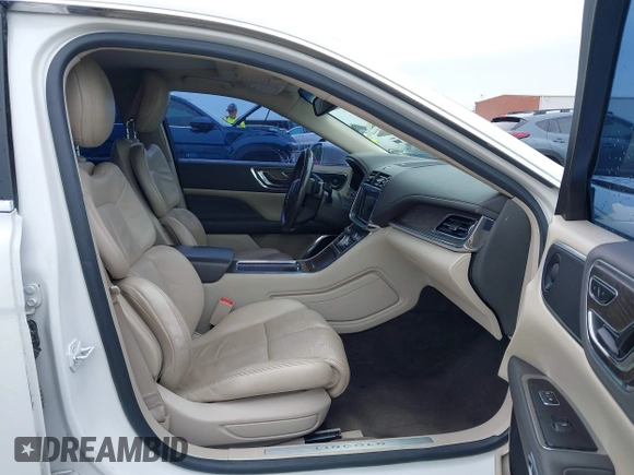 2017 Lincoln Continental Select z VIN 1LN6L9SK5H5616680, wystawiony jako IAAI lot #42465865 z przebiegiem 86 686 mil mil oraz . Historia ofert i sprzedaży dostępna na DreamBid. Obrazek 5.