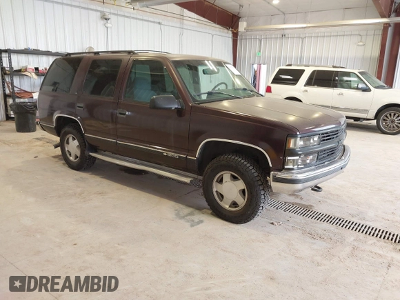 1996 Chevrolet Tahoe z VIN 1GNEK13R3TJ387858, wystawiony jako IAAI lot #41675147 z przebiegiem 196 811 mil mil oraz . Historia ofert i sprzedaży dostępna na DreamBid. Obrazek 1.