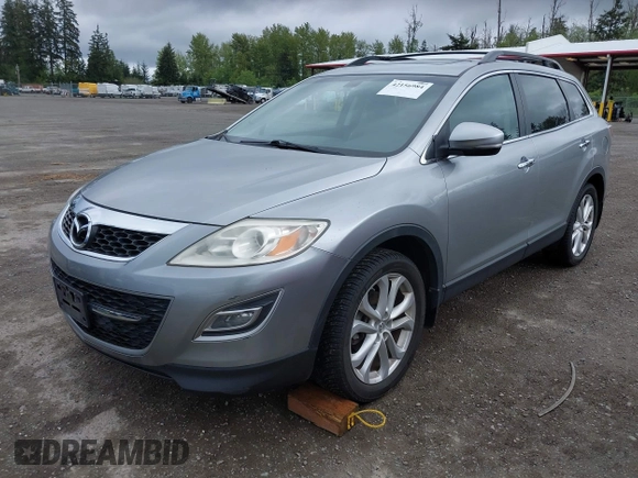 2012 Mazda CX-9 Grand Touring with VIN JM3TB3DV2C0367606, listed as a IAAI auction lot 42156984 with 101,347 mi miles. Bid and sale history available at carsss.com. Image 2.