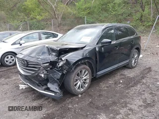 2021 Mazda CX-9 Carbon Edition with VIN JM3TCADY4M0517535, listed as a IAAI auction lot 41821261 with 60,053 mi miles. Bid and sale history available at carsss.com. Image 17.