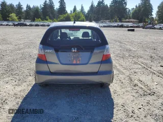 2013 Honda Fit с VIN JHMGE8H34DC069516, выставлен на аукционе Copart как лот 59993335 с пробегом 128 798 миль миль и Списание • Salvage title. История ставок и продаж доступна на DreamBid. Изображение 6.