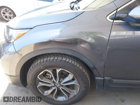 2021 Honda CR-V EX z VIN 2HKRW1H5XMH407361, wystawiony jako IAAI lot #42406157 z przebiegiem 51 493 mil mil oraz . Historia ofert i sprzedaży dostępna na DreamBid. Obrazek 18.