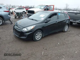 2014 Hyundai Accent GS with VIN KMHCT5AE9EU197712, listed as a IAAI auction lot 41493618 with 83,890 mi miles. Bid and sale history available at carsss.com. Image 2.