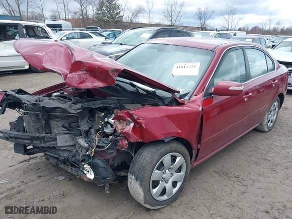 2009 Kia Optima LX with VIN KNAGE228295292892, listed as a IAAI auction lot 41812221 with 179,276 mi miles. Bid and sale history available at carsss.com. Image 6.