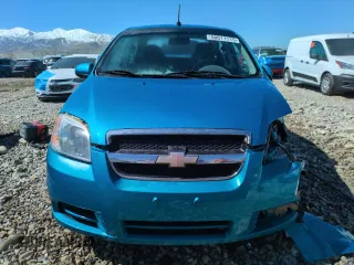 2009 Chevrolet Aveo 1LT z VIN KL1TD56E89B632383, wystawiony jako Copart lot #50611115 z przebiegiem 117 109 mil mil oraz Szkoda całkowita • Salvage title. Historia ofert i sprzedaży dostępna na DreamBid. Obrazek 5.