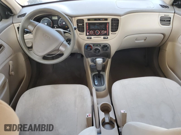2009 Kia Rio LX with VIN KNADE223996521831, listed as a Copart auction lot 69126284 with 183,796 mi miles and Salvage Title. Bid and sale history available at DreamBid. Image 8.