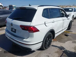 2022 Volkswagen Tiguan SE R-Line Black with VIN 3VVCB7AX9NM009779, listed as a IAAI auction lot 41696952 with Not provided miles and . Bid and sale history available at DreamBid. Image 4.