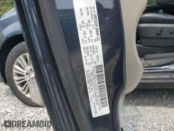 2014 Chrysler Town & Country Touring L 30th Anniversary with VIN 2C4RC1CG8ER297321, listed as a Copart auction lot 59712014 with 128,746 mi miles and Clean Title. Bid and sale history available at DreamBid. Image 13.