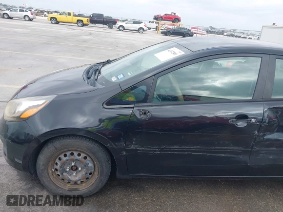 2015 Kia Rio LX with VIN KNADM4A39F6440291, listed as a IAAI auction lot 41532881 with 97,238 mi miles. Bid and sale history available at carsss.com. Image 18.