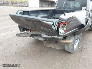 2005 Mazda B-Series 4WD Truck SE with VIN 4F4ZR47E15PM05750, listed as a IAAI auction lot 41850056 with 163,605 mi miles. Bid and sale history available at carsss.com. Image 6.