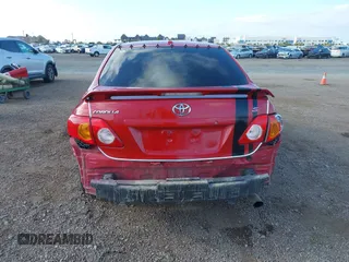2009 Toyota Corolla with VIN 1NXBU40EX9Z027482, listed as a IAAI auction lot 42149978 with 164,318 mi miles. Bid and sale history available at carsss.com. Image 16.