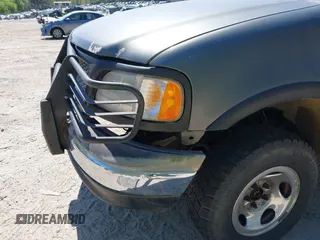 2003 Ford F-150 XL with VIN 1FTRF18243NB29920, listed as a IAAI auction lot 42037138 with 230,215 mi miles and . Bid and sale history available at DreamBid. Image 6.