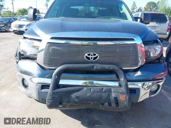 2010 Toyota Tundra with VIN 5TFEY5F11AX097360, listed as a IAAI auction lot 41990256 with 350,830 mi miles and . Bid and sale history available at DreamBid. Image 6.