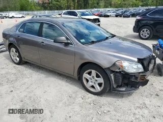 2012 Chevrolet Malibu 1LS with VIN 1G1ZB5E01CF229580, listed as a Copart auction lot 56481615 with 133,708 mi miles and Clean Title. Bid and sale history available at DreamBid. Image 4.