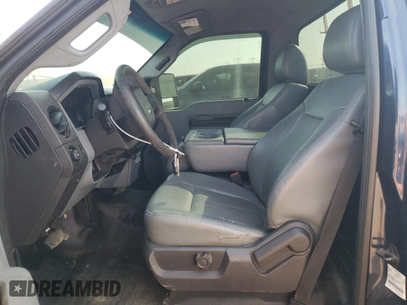2013 Ford F-250 XL with VIN 1FTBF2A6XDEB58957, listed as a Copart auction lot 71778034 with 131,663 mi miles and Salvage Title. Bid and sale history available at DreamBid. Image 7.