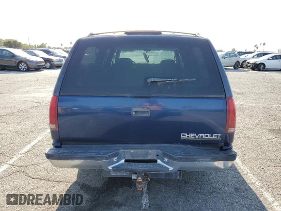 1999 Chevrolet Suburban with VIN 3GNEC16RXXG254126, listed as a Copart auction lot 52051405 with 113,554 mi miles and Clean title. Bid and sale history available at DreamBid. Image 6.