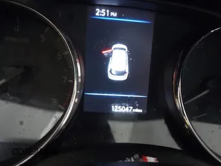 2018 Nissan Rogue SV with VIN KNMAT2MV8JP597520, listed as a IAAI auction lot 41963674 with 125,047 mi miles. Bid and sale history available at carsss.com. Image 7.
