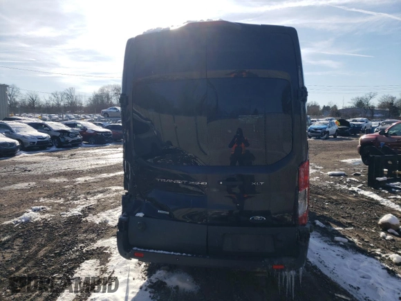 2018 Ford Transit XL z VIN 1FBVU4XGXJKA27026, wystawiony jako Copart lot #85449514 z przebiegiem 142 942 mil mil oraz Szkoda całkowita • Salvage title. Historia ofert i sprzedaży dostępna na DreamBid. Obrazek 6.