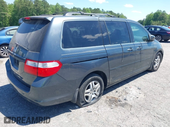 2006 Honda Odyssey EX-L with VIN 5FNRL38796B452606, listed as a IAAI auction lot 42173853 with 190,084 mi miles and . Bid and sale history available at DreamBid. Image 4.