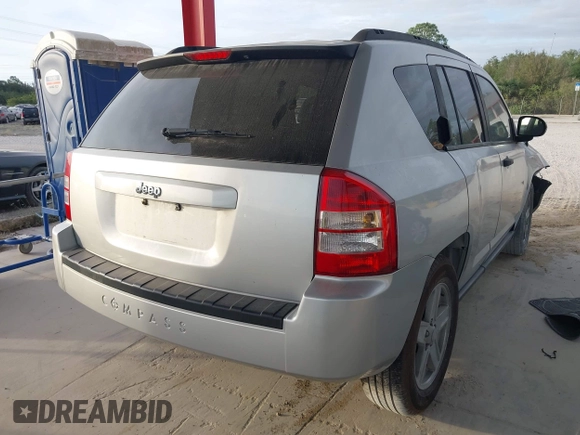 2007 Jeep Compass Sport with VIN 1J8FT47W37D200398, listed as a IAAI auction lot 40914539 with 183,664 mi miles. Bid and sale history available at carsss.com. Image 4.