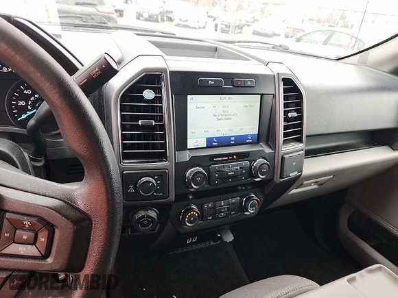 2020 Ford F-150 XL with VIN 1FTFX1E42LKD57437, listed as a IAAI auction lot 42088235 with 71,994 mi miles. Bid and sale history available at carsss.com. Image 1.
