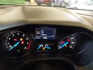 2015 Ford Focus SE with VIN 1FADP3F2XFL201554, listed as a IAAI auction lot 41817418 with 101,938 mi miles. Bid and sale history available at carsss.com. Image 7.