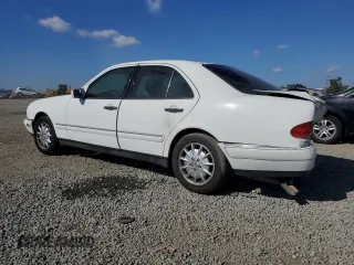 1999 Mercedes-Benz E-Class with VIN WDBJF65H6XA762532, listed as a Copart auction lot 79925364 with 196,487 mi miles and Salvage Title. Bid and sale history available at carsss.com. Image 2.