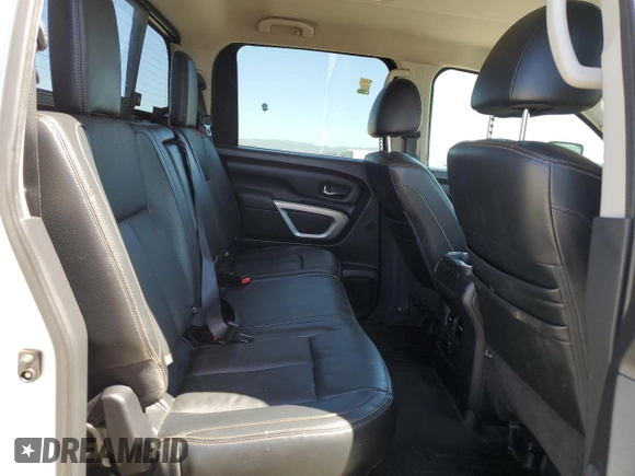 2017 Nissan Titan Pro-4X z VIN 1N6BA1F40HN559615, wystawiony jako Copart lot #57636455 z przebiegiem 99 803 mil mil oraz Szkoda całkowita • Salvage title. Historia ofert i sprzedaży dostępna na DreamBid. Obrazek 10.