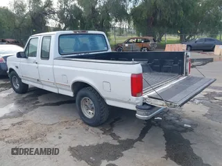 1996 Ford F-150 with VIN 1FTEX15H9TKA56551, listed as a IAAI auction lot 41674788 with 314,443 mi miles. Bid and sale history available at carsss.com. Image 3.