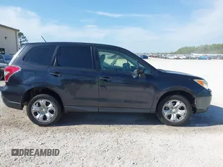 2014 Subaru Forester 2.5i with VIN JF2SJAAC0EH477090, listed as a IAAI auction lot 42080193 with 277,527 mi miles and . Bid and sale history available at DreamBid. Image 13.