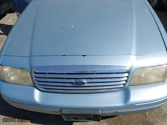 2004 Ford Crown Victoria LX with VIN 2FAFP74W64X121657, listed as a IAAI auction lot 41715463 with 205,885 mi miles. Bid and sale history available at carsss.com. Image 6.