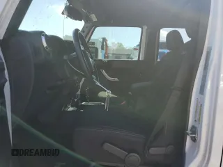 2017 Jeep Wrangler Unlimited Sahara with VIN 1C4BJWEG4HL504429, listed as a Copart auction lot 51370715 with 52,286 mi miles and Salvage Title. Bid and sale history available at carsss.com. Image 7.