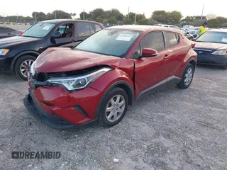 2019 Toyota C-HR XLE with VIN NMTKHMBX1KR070401, listed as a IAAI auction lot 42000335 with 45,643 mi miles. Bid and sale history available at carsss.com. Image 2.