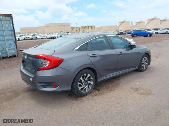 2016 Honda Civic Sedan EX with VIN 19XFC2F79GE011565, listed as a IAAI auction lot 41668694 with 123,802 mi miles. Bid and sale history available at carsss.com. Image 4.