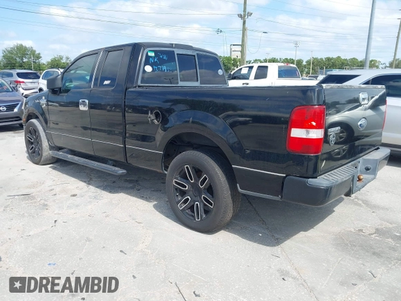 2004 Ford F-150 STX with VIN 1FTRX12W64NB79955, listed as a IAAI auction lot 41939508 with 198,742 mi miles. Bid and sale history available at carsss.com. Image 3.