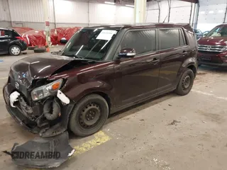 2009 Scion xB with VIN JTLKE50E391078402, listed as a IAAI auction lot 41616104 with 119,165 mi miles. Bid and sale history available at carsss.com. Image 2.