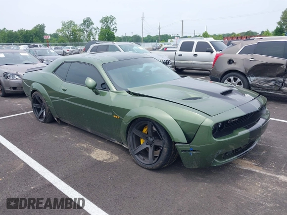 2021 Dodge Challenger R/T Scat Pack z VIN 2C3CDZFJ2MH559741, wystawiony jako IAAI lot #42264991 z przebiegiem 51 040 mil mil oraz . Historia ofert i sprzedaży dostępna na DreamBid. Obrazek 1.