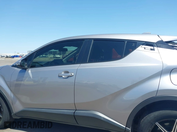 2020 Toyota C-HR LE with VIN JTNKHMBX4L1088502, listed as a IAAI auction lot 41982312 with 69,160 mi miles and . Bid and sale history available at DreamBid. Image 14.