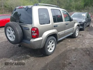 2005 Jeep Liberty Limited z VIN 1J4GK58K05W593417, wystawiony jako IAAI lot #41811582 z przebiegiem 116 027 mil mil oraz . Historia ofert i sprzedaży dostępna na DreamBid. Obrazek 4.