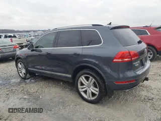 2012 Volkswagen Touareg Sport z VIN WVGFK9BP6CD005005, wystawiony jako Copart lot #46802355 z przebiegiem 141 430 mil mil oraz Czysty tytuł • Clean title. Historia ofert i sprzedaży dostępna na DreamBid. Obrazek 2.