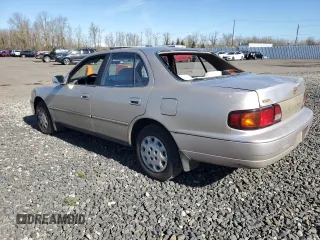 1996 Toyota Camry DX with VIN JT2BG12K1T0395294, listed as a Copart auction lot 47295405 with 259,898 mi miles and Salvage Title. Bid and sale history available at carsss.com. Image 2.