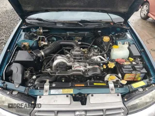 1996 Subaru Legacy Outback with VIN 4S3BG685XT7984194, listed as a Copart auction lot 77999224 with 130,804 mi miles and Salvage title. Bid and sale history available at DreamBid. Image 12.