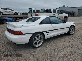 1991 Toyota MR2 z VIN JT2SW21N2M0010699, wystawiony jako Copart lot #70027794 z przebiegiem 136 755 mil mil oraz Szkody całkowita. Historia ofert i sprzedaży dostępna na DreamBid. Obrazek 3.