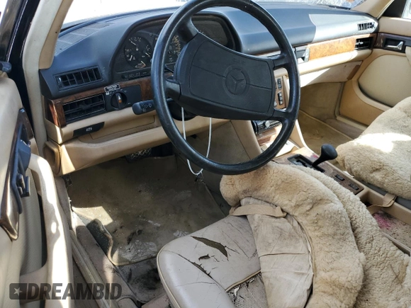 1986 Mercedes-Benz 560 with VIN WDBCA39D0GA268955, listed as a Copart auction lot 77190964 with 99,702 mi miles and Non Repairable. Bid and sale history available at DreamBid. Image 8.